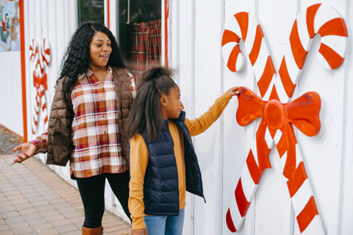 Mom and daughter participate in a scavenger hunt