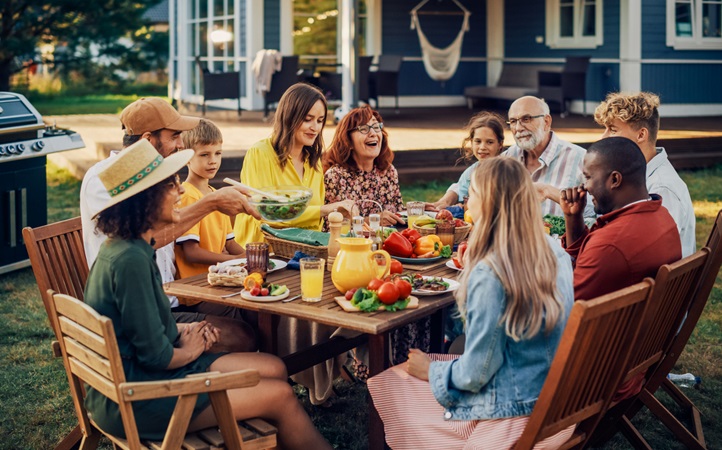 Diverse group of friends and family enjoying a bbq