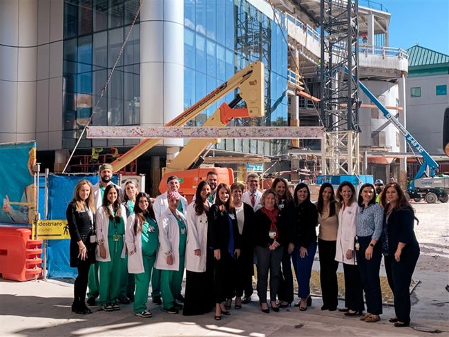 Group of Nicklaus Children's employees outside of construction site