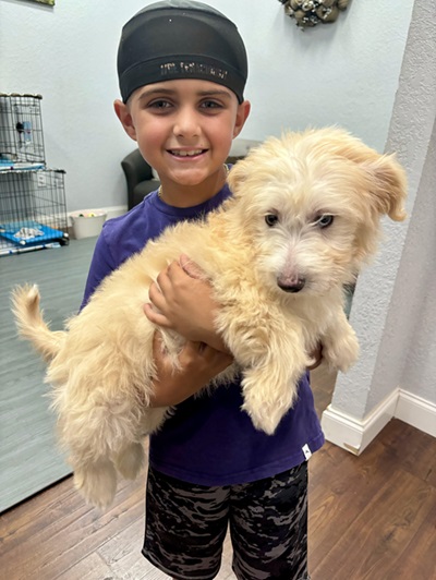 Rydon holding his dog