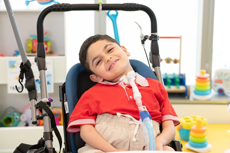 Patient Santino smiling.